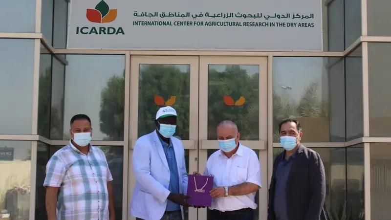 Dr. Abdoul Aziz Niane (center left), Dr. Azaiez Ouled Belgacem (center right) Dr. Abdoul Aziz Niane (center left), Dr. Azaiez Ouled Belgacem (center right)
