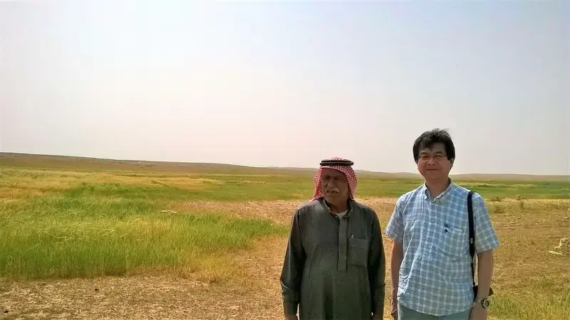 Jordanian rangeland farmer Mr. Ali Askar from Al Majeddyeh village with Prof. Tsunekawa of Tottori University (Japan) inspect a rainwater harvesting research site. Jordanian rangeland farmer Mr. Ali Askar from Al Majeddyeh village with Prof. Tsunekawa of Tottori University (Japan) inspect a rainwater harvesting research site.