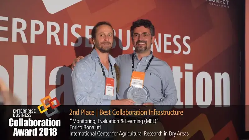 Enrico Bonaiuti (right) receiving the Enterprise Business Collaboration Award Enrico Bonaiuti (right) receiving the Enterprise Business Collaboration Award