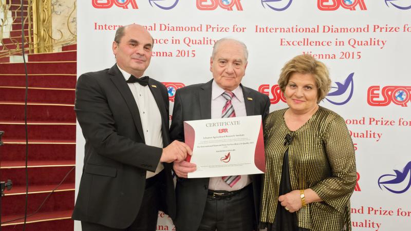 Dr. Michel Afram (left) being awarded "Ambassador of Quality" by the Business Initiative Directions