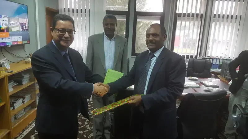 Mr. Abousabaa receives a present from Dr. Fentahun Mengistu, Director General of EIAR Mr. Abousabaa receives a present from Dr. Fentahun Mengistu, Director General of EIAR